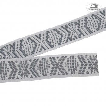 reflexband med hemslojdsstil i fargen vit