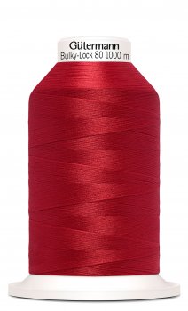 En rulle med röd bulky-lock tråd