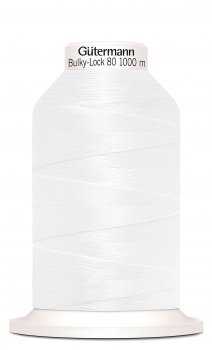 En rulle med vit bulky-lock tråd