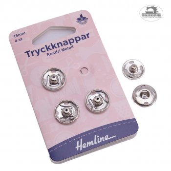 Silverfärgade tryckknappar i metall