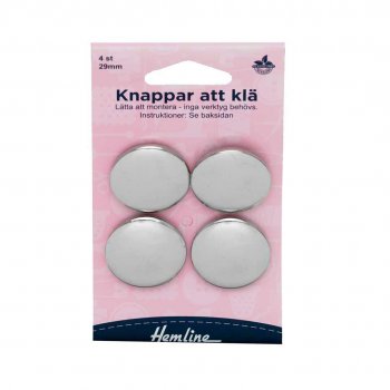 Fyra 29mm stora knappformar för att klä egna knappar.