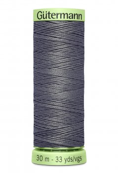En rulle grå top stitch tråd