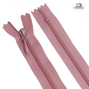 Ett rosa blixtlås till klänningar och kjolar i längd 25 cm
