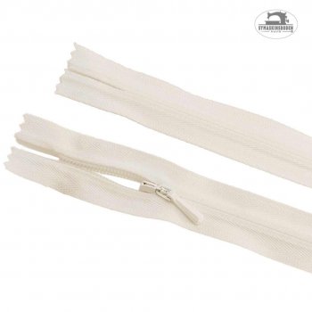 Ett dolt blixtlås som är benvitt och 25 cm långt.